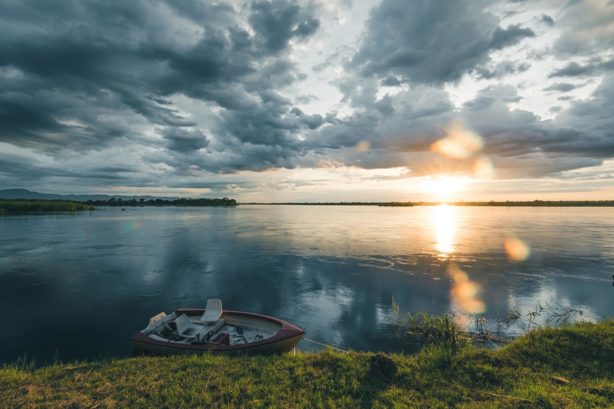 Calm outdoor shoreline at sunrise