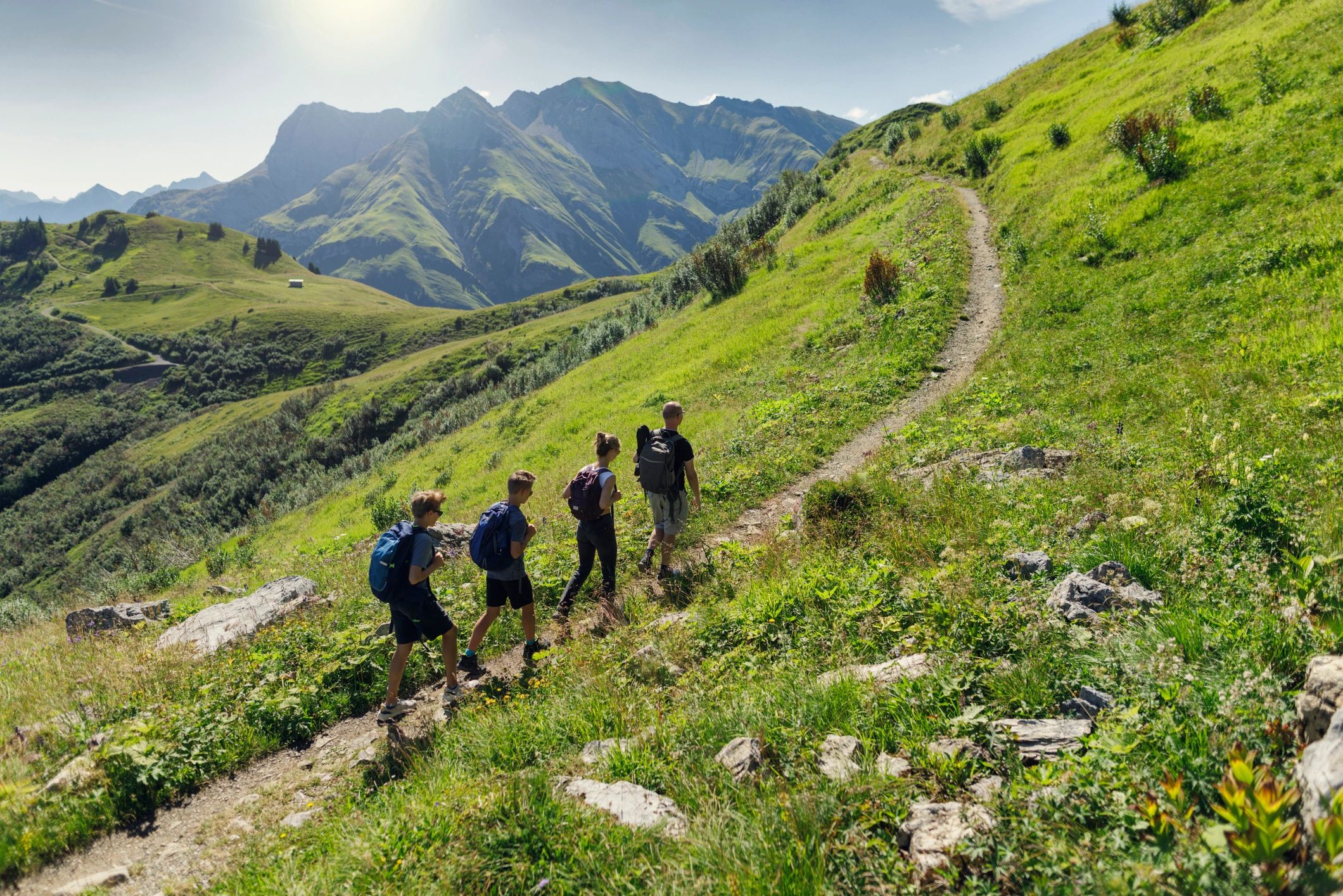 Outdoor team hiking in the mountains